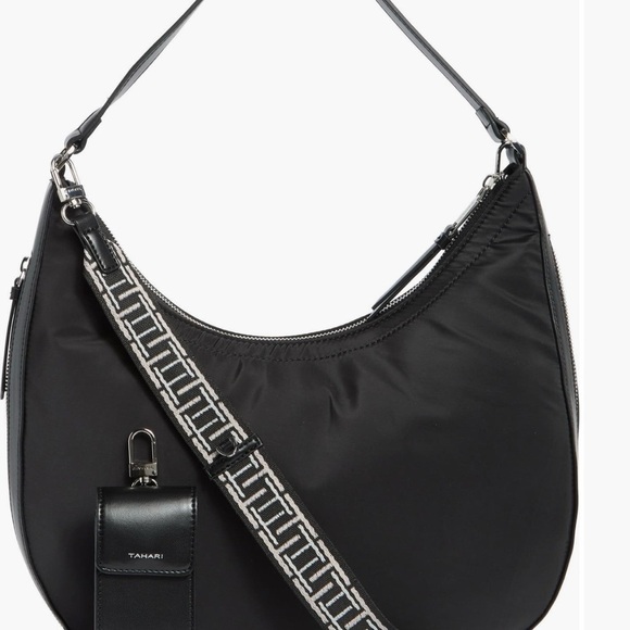 Tahari
Minetta Expandable
Crescent Bag NWT - Picture 3 of 6